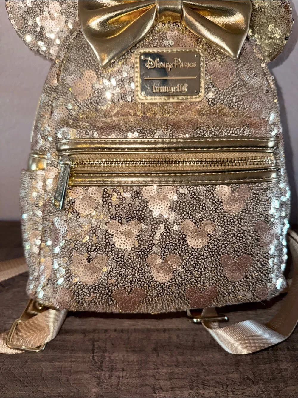 Loungefly Disney gold sequin backpack with hidden mickeys